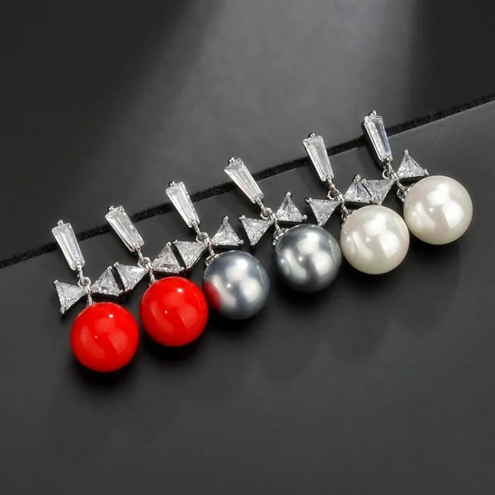 925 Sterling Silver Pearl & Bow Earrings