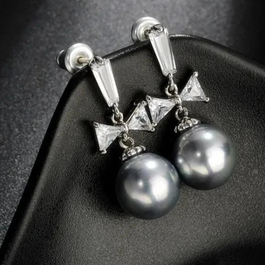 925 Sterling Silver Pearl & Bow Earrings