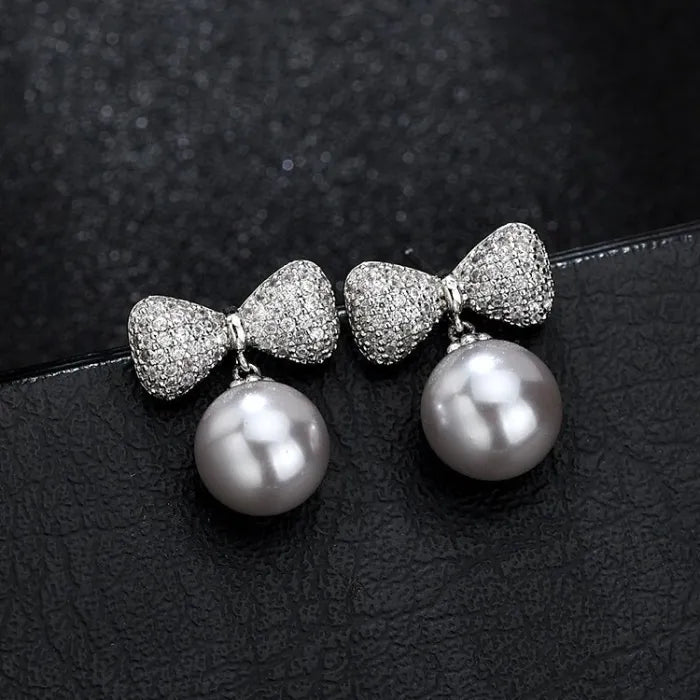 Crystal and Pearl bow cubic zirconia stud earrings