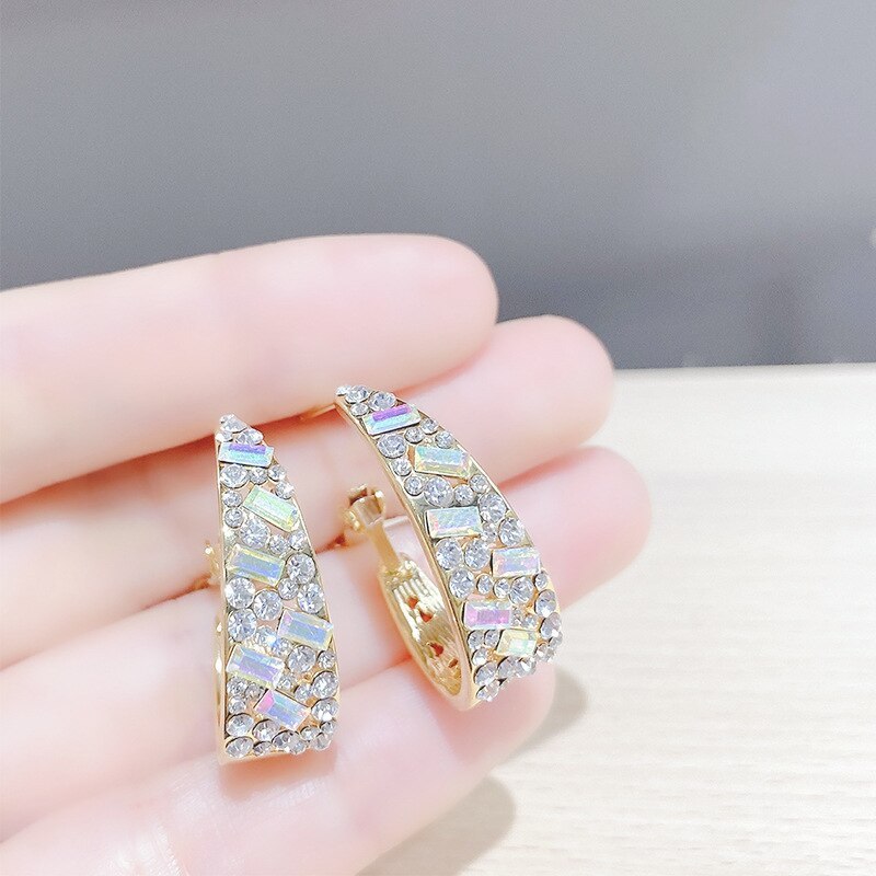 Oval crystal golden earrings