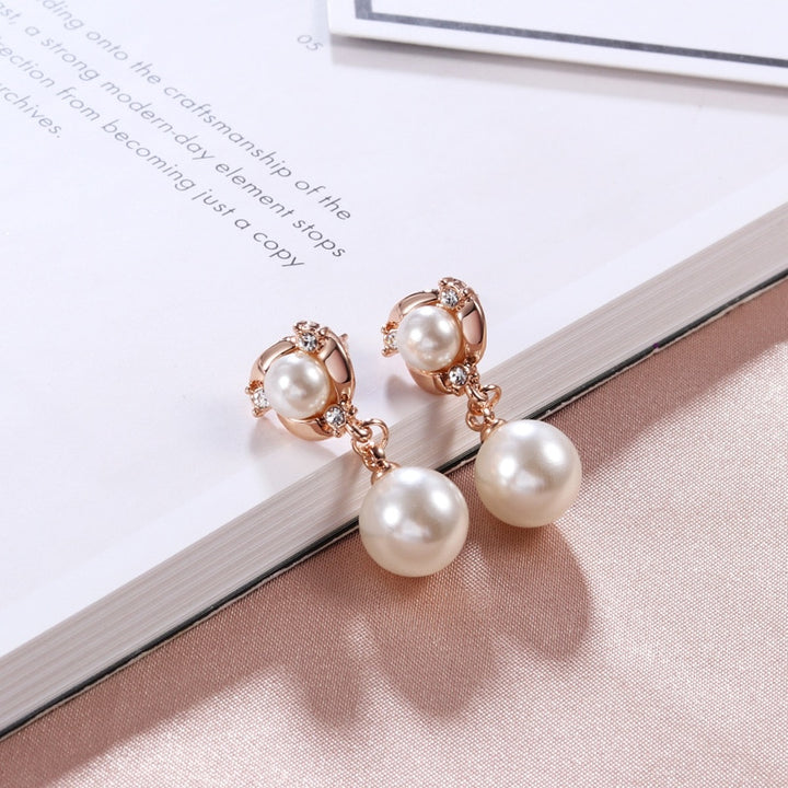 Pearl silver plated drop earrings